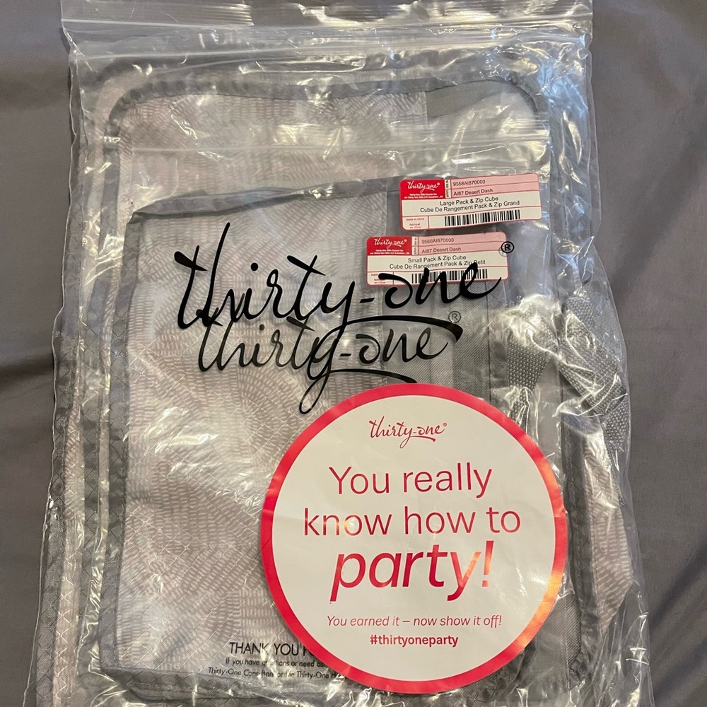 Thirty one pack n zip cubes.